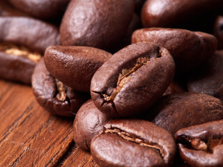 Macro photo of freshly ground coffee in electric coffee grinder.