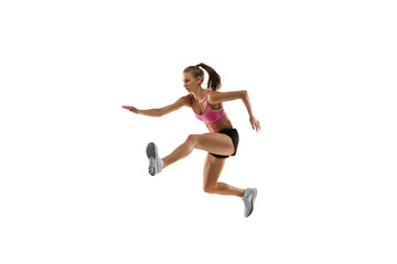 In jump. Caucasian professional female athlete, runner training isolated on white studio background. Muscular, sportive woman. Concept of action, motion, youth, healthy lifestyle. Copyspace for ad.