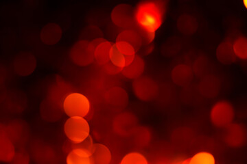 Bokeh abstract texture colorful red defocused background Dimmed light.