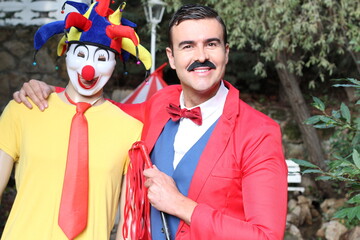 Circus tamer and a clown 