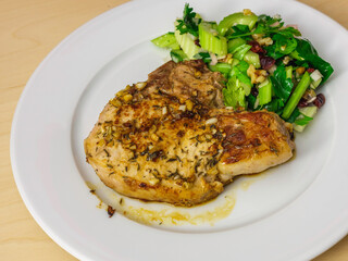 Pan-Seared Steak with Garlic, Onion, Herb Butter, Salary, and Mixed Nuts 