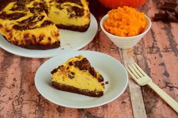 Homemade pumpkin chocolate swirl cheesecake