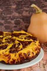 Homemade pumpkin chocolate swirl cheesecake