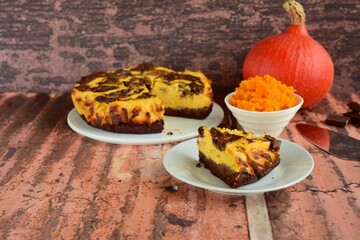 Homemade pumpkin chocolate swirl cheesecake