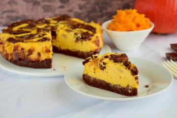 Homemade pumpkin chocolate swirl cheesecake