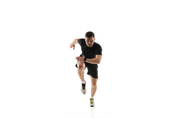 Fototapeta na wymiar Starting. Caucasian professional sportsman training isolated on white studio background. Muscular, sportive man practicing. Copyspace. Concept of action, motion, youth, healthy lifestyle.