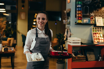 Fototapeta premium waitress working in restaurant or cafeteria