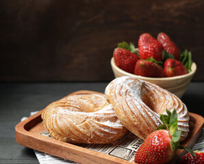 strawberries in a bowl and dessert