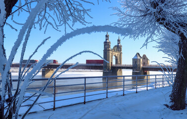 Queen Louise Bridge. Trees are covered with hoarfrost, winter landscape Sovetsk, Kaliningrad region