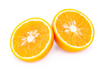 Fototapeta premium two halves of a cut orange on a white background isolated