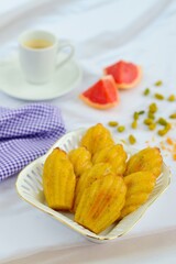 Pistachio grapefruit lemon Madeleine with espresso