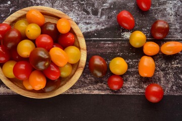 Assorted colourful fresh cherry tomatoes. Flat lay