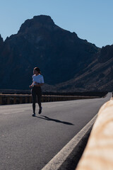 young girl running outdoors in the daytime