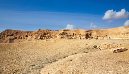 Fototapeta na wymiar Asphalt winding road in the Judean desert among the Eilat mountains, Israel, Middle East