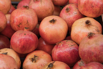 Group of pomegranates. Pomegranate close up, background