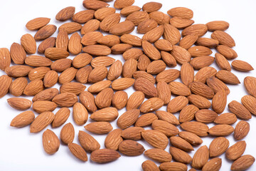 mumbai / India 11 March 2018 Almond Nuts or Baadaam Nuts on a white background
