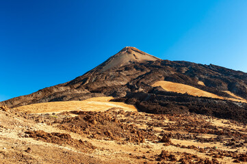 Silhouette of volcano del Teide against  blue sky. Pico del Teide mountain in El Teide National park. Tenerife, Canary Islands, Spain