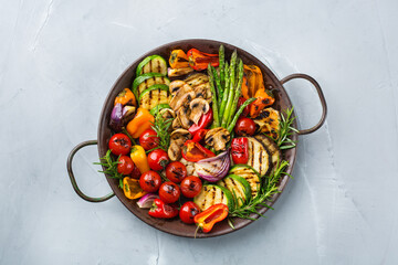 Seasonal summer grilled vegetables in a pan © aamulya