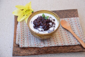 Bubur ketan hitam,  an Indonesian sweet dessert made from black glutinous rice porridge with coconut milk and palm sugar 