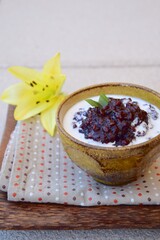 Bubur ketan hitam,  an Indonesian sweet dessert made from black glutinous rice porridge with coconut milk and palm sugar 