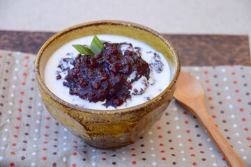 Bubur ketan hitam,  an Indonesian sweet dessert made from black glutinous rice porridge with coconut milk and palm sugar 