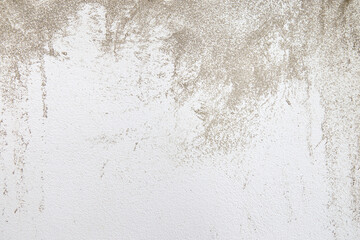 Old white plaster wall surface with wall peeling and scratches