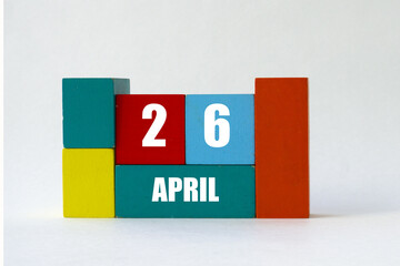 Day of month. Cube Calendar on multi-colored cubes on white background