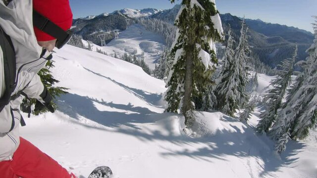 Snowboarding POV Riding in Trees with Fresh Powder Snow