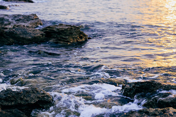Blurred abstract natural background of sea water with waves and foam. Motion blur. Nature. 