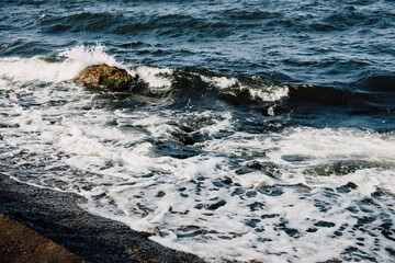 Wave on the rocky beach