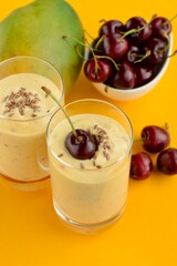 Refreshing drink mango cherry smoothie with flax seeds