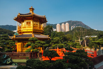 Fototapeta na wymiar Gold pavilion in Hong Kong garden