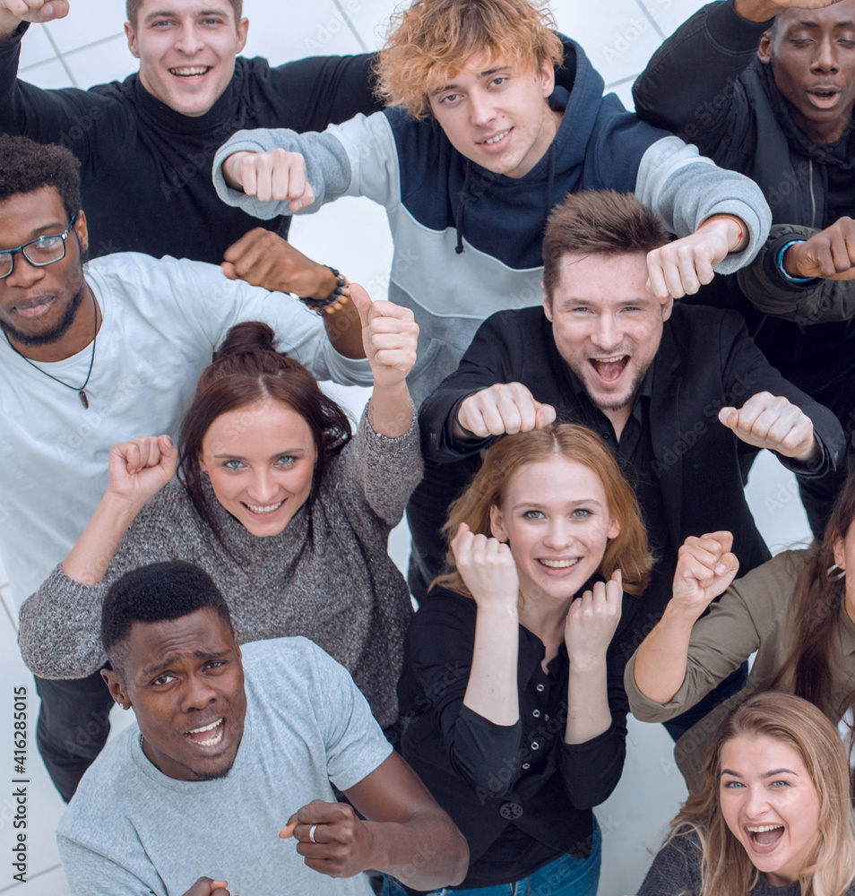 Wall mural team of diverse young people looking at the camera