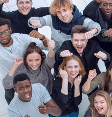 team of diverse young people looking at the camera
