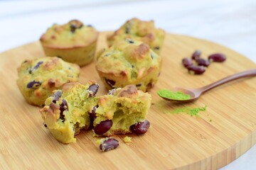 Matcha cashew kidney bean muffins on wooden board