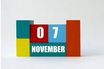Day of month. Cube Calendar on multi-colored cubes on white background