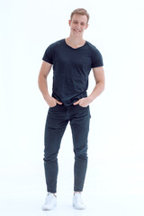 Obraz premium in full growth. a handsome young man in a black t-shirt