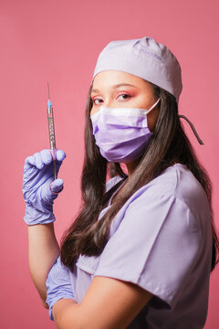 Woman with mask and vaccine
