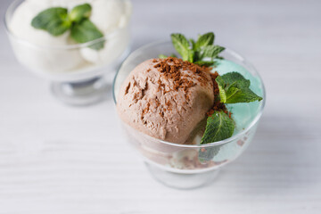 Ice-cream scoops variety in glass sundae bowls, refreshing dessert for summertime. Tasty homemade food, culinary concept
