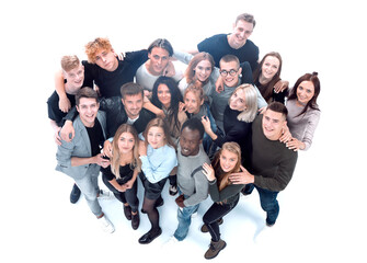 group of happy young people pointing at the camera.