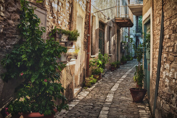 Fototapeta na wymiar Quiet narrow street in an old village of Pano Lefkara. Larnaca District, Cyprus