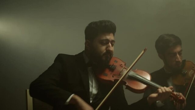 the string quartet plays classical music,medium shoot