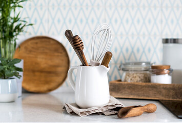 Background of kitchen utensils. Wooden objects for cooking. Copy space.