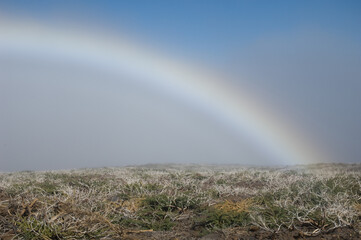 Rainbow in the fog.