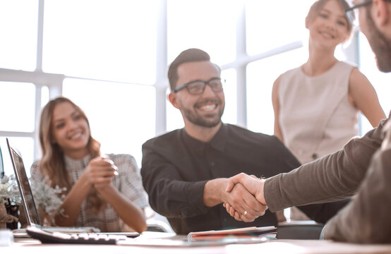 group of young employees in the workplace in the office