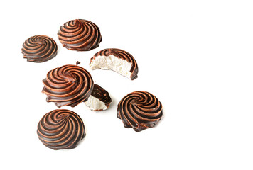 Chocolate-covered marshmallow close-up, isolated on a white background.Selective focus.