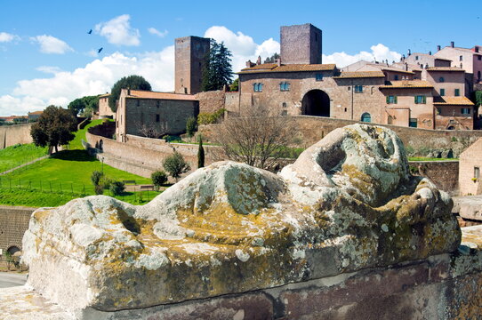 View of Tuscania from Piazza Bastianini and Etruscan sarcophagus, Tuscania, Viterbo Province, Latium