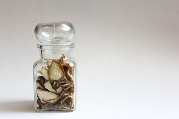 peel citrus tangerine in a glass jar on a white background ingredient