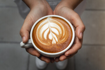 cup of coffee in hand
