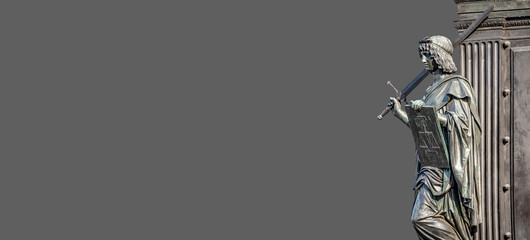 Banner with a knight woman, an Amazonian with sword and shield at historical downtown in Dresden, Germany, derails, closeup, with copy space and solid background.